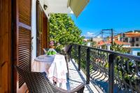 A balcony or terrace at Tasia's Holiday House