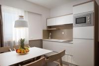 Kuchyň nebo kuchyňský kout v ubytování Hotel Tamaris