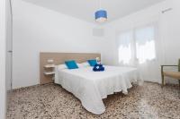 Postel nebo postele na pokoji v ubytování Villa Rosales