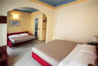 Posteľ alebo postele v izbe v ubytovaní Hotel Fra I Pini