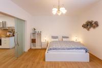 Łóżko lub łóżka w pokoju w obiekcie Apartments Villa Whitehouse