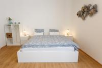 Łóżko lub łóżka w pokoju w obiekcie Apartments Villa Whitehouse