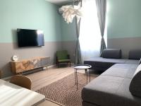 Televízia a/alebo spoločenská miestnosť v ubytovaní Luxury Central Apartment by Carpe Diem