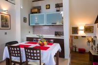 Kuchyňa alebo kuchynka v ubytovaní La Casa di Pietra Villas