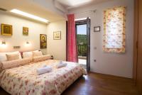 Posteľ alebo postele v izbe v ubytovaní La Casa di Pietra Villas