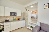 Kuchyňa alebo kuchynka v ubytovaní Apartment Villa Ahava Buža