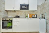 Kuchyňa alebo kuchynka v ubytovaní Apartment Villa Ahava Buža