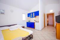 Kuchyň nebo kuchyňský kout v ubytování Apartmani Srzic