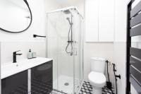 a bathroom with a shower and a toilet and a sink at #29 Suite Gambetta AC Sea view 2 bedrooms 1min Walk to Promenade &amp; Sea in Nice