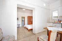 Kuchyň nebo kuchyňský kout v ubytování Apartmani Srzic