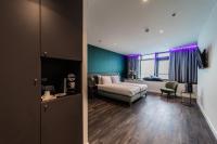 Un ou plusieurs lits dans un hébergement de l'établissement De Pier Suites