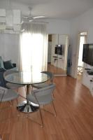 Televízia a/alebo spoločenská miestnosť v ubytovaní Apartamento Barrio Picasso