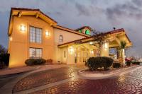 a large building on a street at night at La Quinta Inn by Wyndham El Paso East Lomaland in El Paso