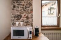 Kuchyňa alebo kuchynka v ubytovaní PICCOLA VILLA nel Centro Storico