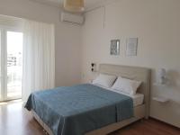 Posteľ alebo postele v izbe v ubytovaní Harmony Apartment Kavala