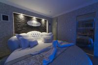 Ein Bett oder Betten in einem Zimmer der Unterkunft La Demeure De Charme