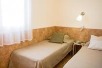 Postel nebo postele na pokoji v ubytování Beach Resort La Margarita