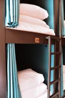 Ein Bett oder Betten in einem Zimmer der Unterkunft Durty Nelly&#39;s Inn