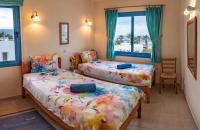 Postel nebo postele na pokoji v ubytování Penthouse direkt am Meer