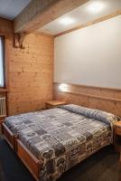 A bed or beds in a room at Residence Sci Sport