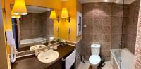 A bathroom at Royal Beach Premium