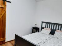 Postel nebo postele na pokoji v ubytování Babyky apartmány
