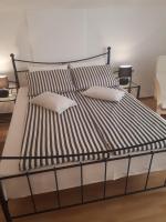 Posteľ alebo postele v izbe v ubytovaní Apartments Petra 23