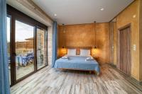 Posteľ alebo postele v izbe v ubytovaní Olive Luxury Suites - ADULTS ONLY