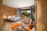 Posteľ alebo postele v izbe v ubytovaní Olive Luxury Suites - ADULTS ONLY