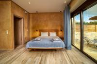 Posteľ alebo postele v izbe v ubytovaní Olive Luxury Suites - ADULTS ONLY