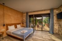 Posteľ alebo postele v izbe v ubytovaní Olive Luxury Suites - ADULTS ONLY