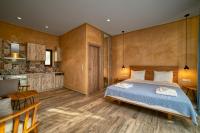 Posteľ alebo postele v izbe v ubytovaní Olive Luxury Suites - ADULTS ONLY