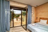 Posteľ alebo postele v izbe v ubytovaní Olive Luxury Suites - ADULTS ONLY