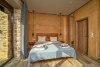Posteľ alebo postele v izbe v ubytovaní Olive Luxury Suites - ADULTS ONLY
