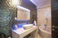 A bathroom at Anemos Luxury Apartments