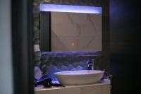 A bathroom at Anemos Luxury Apartments