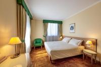Posteľ alebo postele v izbe v ubytovaní Ambassador Palace Hotel