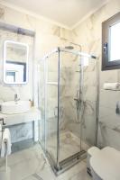 A bathroom at Anemos Luxury Apartments