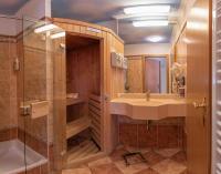 a bathroom with a sink and a shower at Hotel König Ludwig in Altötting