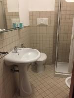A bathroom at Asselta Hotel