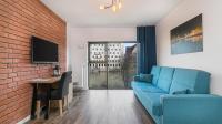 Telewizja i/lub zestaw kina domowego w obiekcie Leopold Winter Residence - BillBerry Apartments