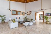 Posezení v ubytování Unique Private Villa with Pools and Golf Cart