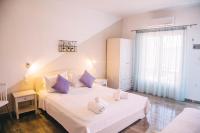 Posteľ alebo postele v izbe v ubytovaní Theodora Rooms
