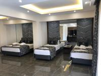 Postel nebo postele na pokoji v ubytování Venus Hotel