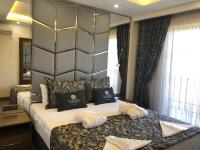 Postel nebo postele na pokoji v ubytování Venus Hotel