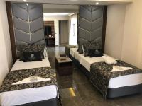 Postel nebo postele na pokoji v ubytování Venus Hotel