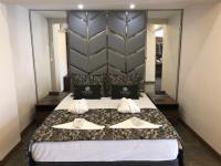 Postel nebo postele na pokoji v ubytování Venus Hotel