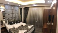 Postel nebo postele na pokoji v ubytování Venus Hotel