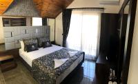 Postel nebo postele na pokoji v ubytování Venus Hotel