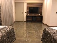 TV a/nebo společenská místnost v ubytování Venus Hotel